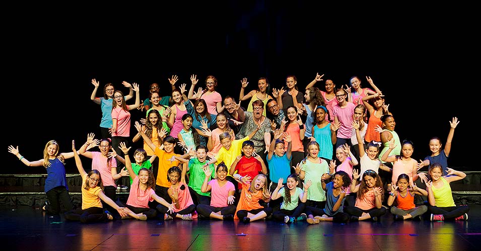 Students perform on the stage
